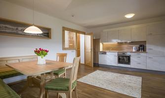 Modern, fully equipped kitchen with cozy dining area