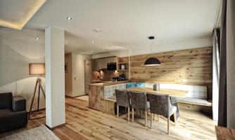 A modern apartment with an open living area and wooden cladding. The dining area is cozy with a large table and stylish chairs.