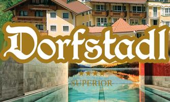 An elegant hotel with luxurious apartments in a picturesque setting. The architecture combines tradition and modernity.