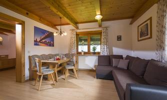 Appartement A - Wohnzimmer mit Essecke