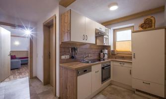 ferienhof_auerhof_walchsee_ferienwohnung_typ a_kue