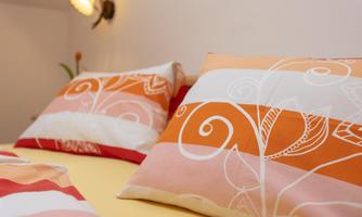 Ferienwohnung Walchsee Schlafzimmer zwei detail