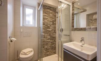 Deluxe 1 - Badezimmer