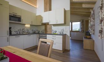 Ferinhaus am Wasserrad - Kücke Blick Wohnzimmer