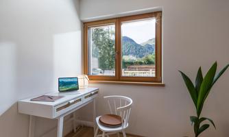 Kaiserwinkl Hideaway Walchsee_Wohnraum_Schre