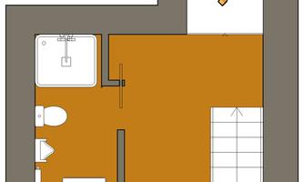 A simple floor plan drawing of a room with a bathroom and a staircase. The walls are gray, and the floor is in a light shade.