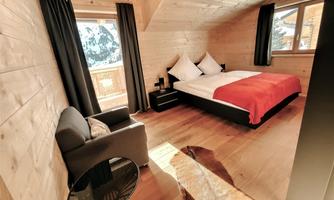 Heidi Chalets Typ Bergwinter - Schlafzimmer Balkon