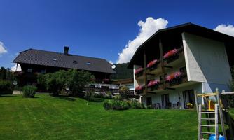 A holiday home with vacation apartments