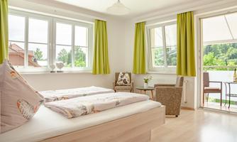 Fewo Typ B - Schlafzimmer mit Sitzecke