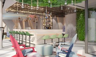 A modern bar with stylish decor and a green wall. Comfortable seating in vibrant colors invites relaxation.