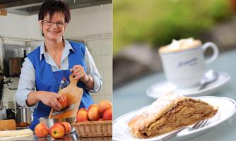 A friendly woman in a kitchen is cutting apples next to a basket of fresh apples. In the background, a delicious apple strudel can be seen with a cup of coffee.