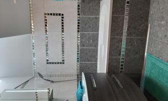 Bathroom with sink and bathtub