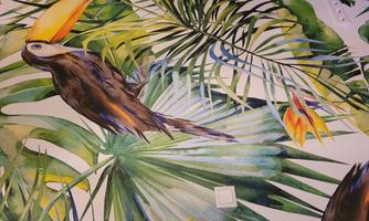 A colorful mural featuring a toucan and lush green plants. The bright colors create a tropical atmosphere.