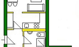 A floor plan of an apartment with various rooms. The balcony is clearly marked, and the layout shows a living and sleeping area.