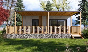 A modern wooden house with a veranda surrounded by trees. The tranquil environment and the well-maintained garden invite relaxation.
