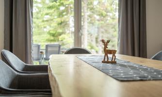 Seating area with chairs in the chalets