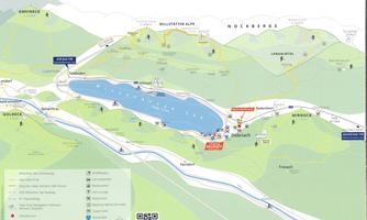 A map of a region with a lake in the center, surrounded by mountains. The map shows hiking and skiing routes as well as various places in the vicinity.