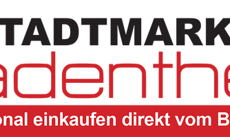 Ein rotes Logo mit dem Text „Regional einkaufen direkt vom Bauern“. Es vermittelt das Konzept des direkten Kaufs von frischen Produkten.