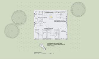 A floor plan of a house with several rooms. In the center, living and sleeping areas as well as a kitchen are drawn in.