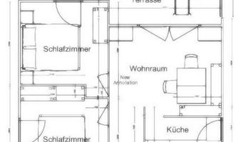A floor plan of a house with several rooms. Visible are bedrooms, a living area, a kitchen, and a terrace.