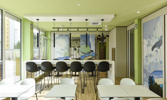 A modern café with bright walls and elegant furniture. Large windows provide plenty of daylight and an inviting atmosphere.