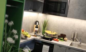 Modern kitchen with gray walls and a preparation area. Fruits, vegetables, and cooking utensils are beautifully arranged on the countertop.