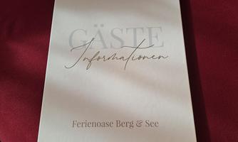 A guest information booklet for the holiday oasis Berg & See. It is elegantly and simply designed.