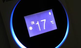 A digital thermostat with a temperature display of 17 °C. The screen is illuminated and shows the status "ON".