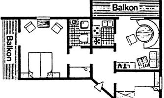 A floor plan of an apartment with two balconies. The rooms include a bedroom, a bathroom, and a living area with a kitchen.