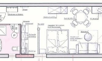 A simple floor plan of an apartment. The plan shows the living and dining area as well as a kitchen and a bathroom.