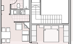 A floor plan of an apartment with an open living and kitchen area. The plan also shows two bedrooms and a south-facing balcony.