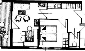 A floor plan of an apartment with various living areas. The rooms are clearly defined and show a functional layout.
