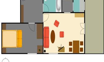 A simple floor plan drawing of an apartment. It shows a bedroom, a living room, and a kitchenette.