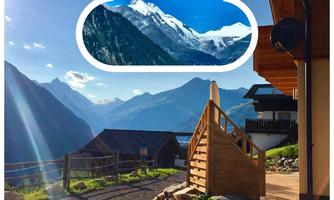 A beautiful view of the mountains with the Großglockner in the background. The sun is shining, and the landscape is stunning and peaceful.