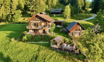 Exterior view with panoramic sauna@Chalet Almhaus Strobl