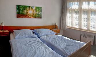 Landhaus-Widmeyer_Fewo7_Schlafzimmer-1