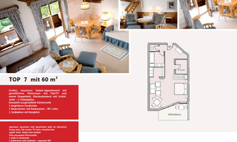 Cozy apartment with an appealing living area, including a dining area and comfort. In the background, large windows with a view and a furnished terrace can be seen.
