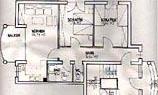 A floor plan of an apartment with several rooms. The spaces are clearly labeled and well-structured.