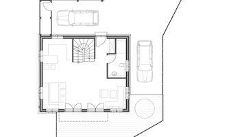 A floor plan of a house with various rooms and a terrace. Next to the building, two parking spaces are marked.