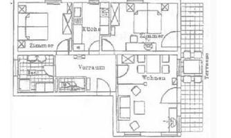 A floor plan of an apartment with various rooms. Featured are a living room, a kitchen, two bedrooms, and an entrance hall.