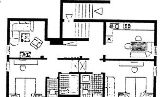 A floor plan of an apartment with several rooms. The rooms include a living room, a kitchen, two bedrooms, and a bathroom.