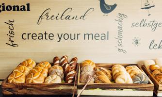 A selection of fresh rolls in a wooden basket. Attractive lettering can be seen in the background.