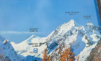 An impressive mountainous landscape with snow-covered peaks. The elevations of the mountains are clearly visible.