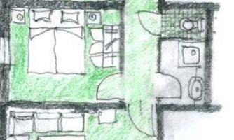 A simple floor plan drawing of an apartment. The rooms are highlighted in green and show two bedrooms, a bathroom, and a kitchen.