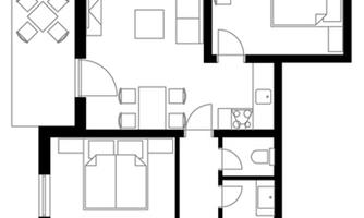 A schematic representation of an apartment layout. The plan shows different rooms such as bedrooms, living rooms, and kitchens.