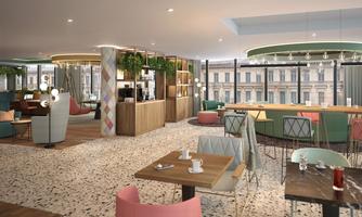 A modern café with stylish interior and plenty of seating.  
Large windows provide bright light and an inviting atmosphere.