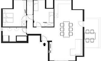 A floor plan of a house that shows two bedrooms, two bathrooms, and a large living area with a dining table. The rooms are clearly arranged and separated by walls.