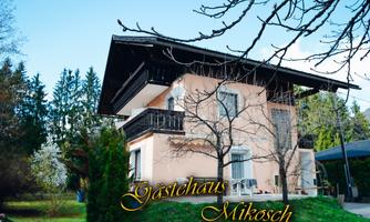 A cozy guesthouse with a balcony and plenty of greenery around. The facade is in gentle colors.