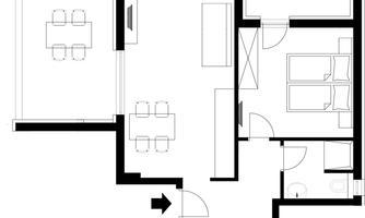 A simple floor plan drawing of an apartment. It shows a living area, two bedrooms, and a dining area.