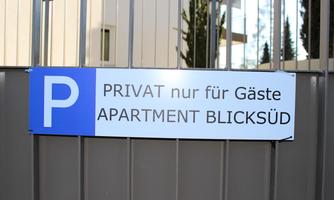 A parking sign for guests of the apartment Blicksüd. It shows the inscription "PRIVATE only for guests."